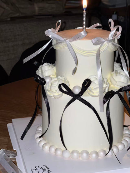 Chic Ivory Bow Cake