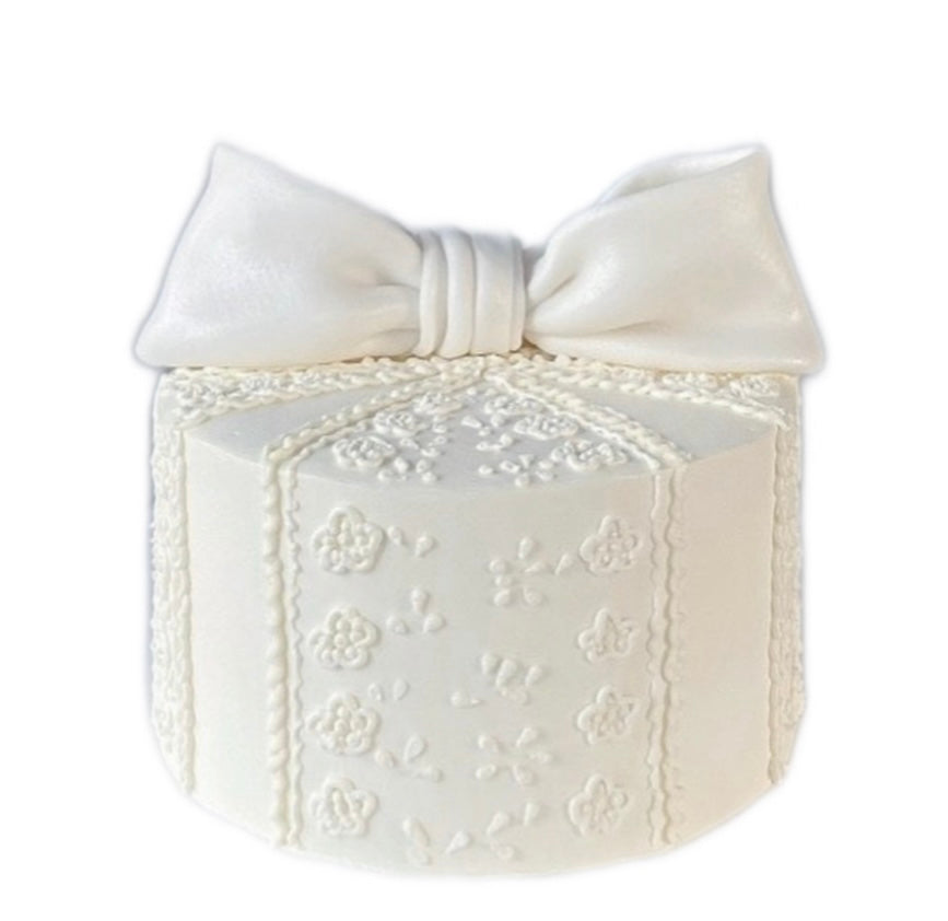 Elegant Lace Bow Cake