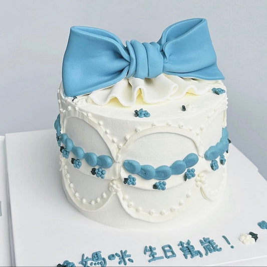 Elegant Blue Bow Cake